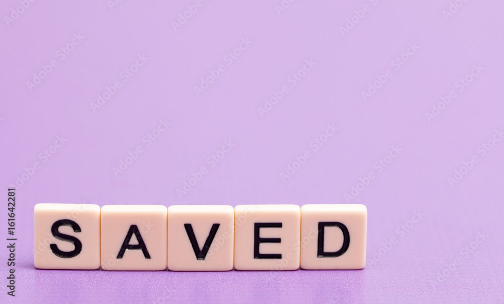 Saved Spelled Out in Tiles Saved Spelled Out in Tiles