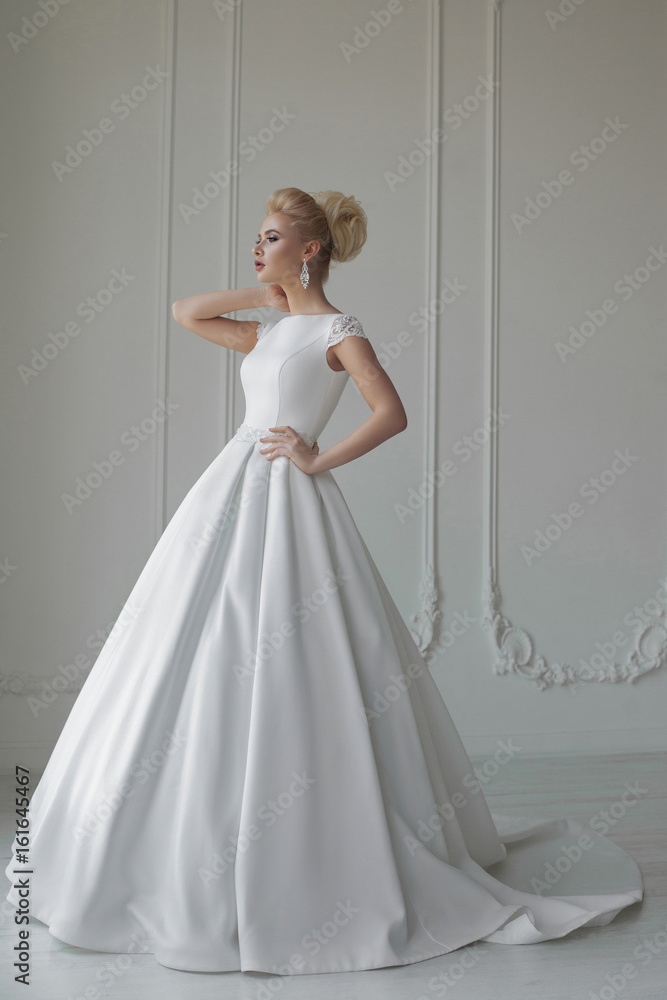 portrait of beautiful blonde bride with fashion hairstyle and make-up portrait of beautiful blonde bride with fashion hairstyle and make-up