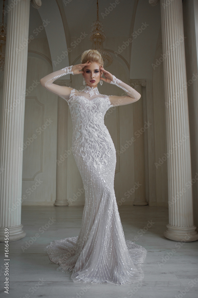 Obraz premium portrait of beautiful blonde bride with fashion hairstyle and make-up
