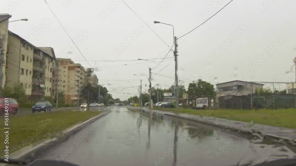 view of automobile windscreen window in rainy weather
view of automobile windscreen window in rainy weather
