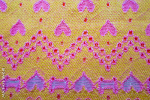 yellow fabric with hearts
