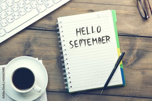 hello september text on notepad