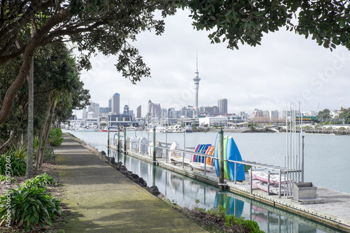 Dinghies and boats at Westhaven Marina with Auckland CBD skyline - New Zealand, NZ
