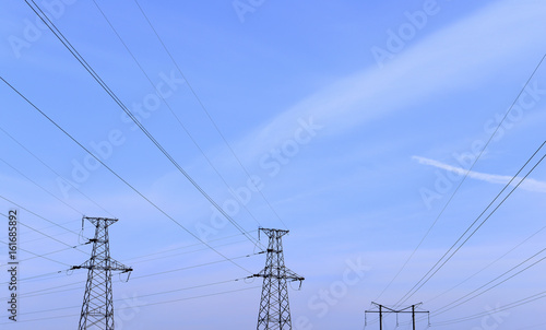 High voltage towers, the background of blue sky