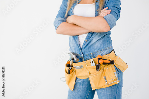 Canvas Print Close-up woman with tool belt