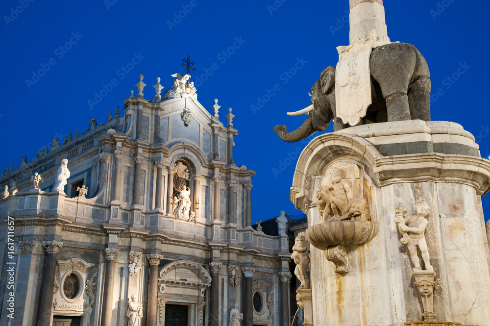 Landmarks of Catania, Sicily; night view of the famous lava stone statue of an elephant and its obelisk in the main Square 