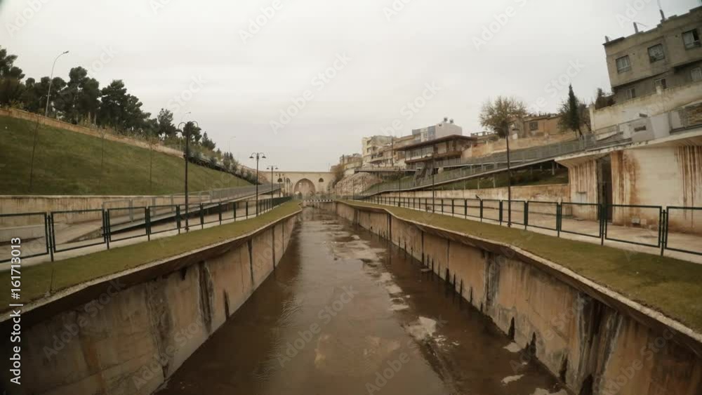 Panorama Ancient Canal Bird Fly Far Bridge Sanliurfa Cloudy Wintry Day Panorama Ancient Canal Bird Fly Far Bridge Sanliurfa Cloudy Wintry Day