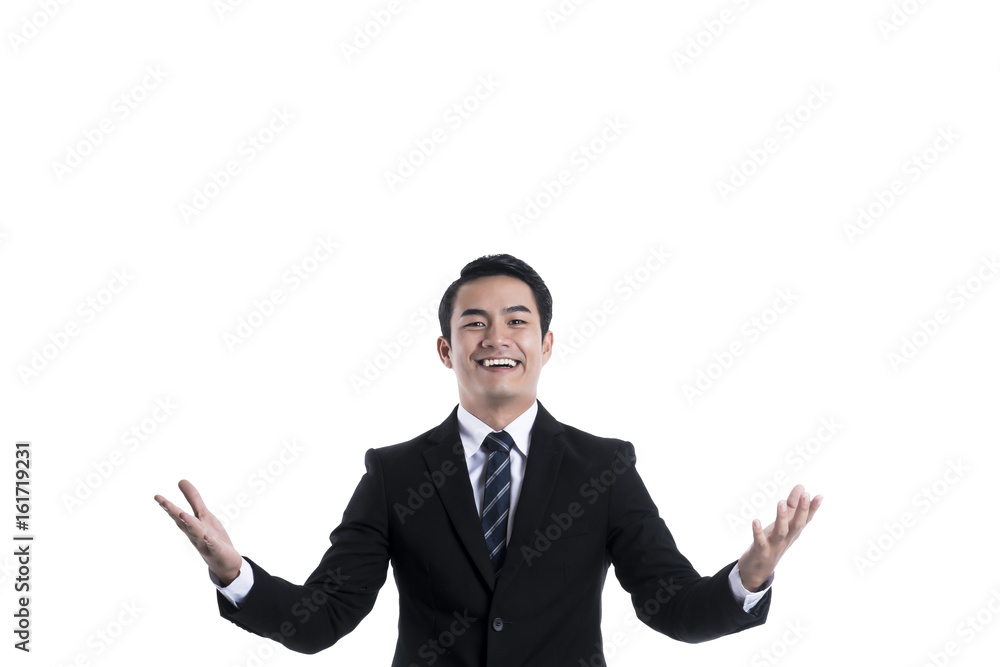 The young businessman smiling and standing and open his arms The young businessman smiling and standing and open his arms