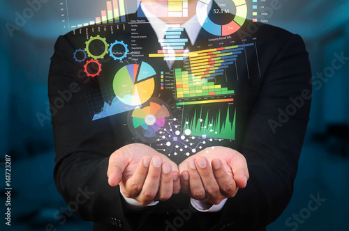 businessman holding data visualization photo