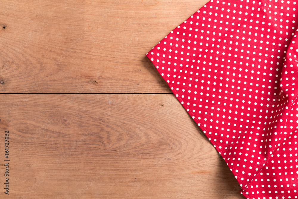 Tablecloths on the wooden table background Tablecloths on the wooden table background