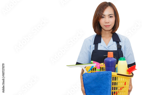 Beautiful Asian maid smile and  holding cleaning equipment in yellow basket on white isolated background with copy space.
