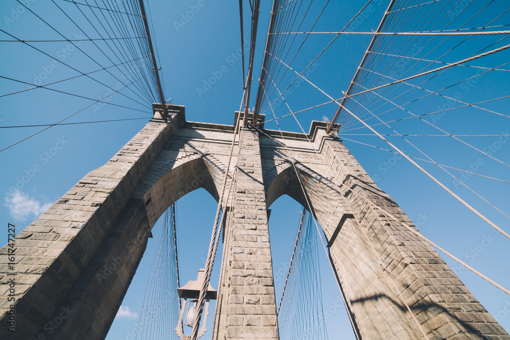 Fototapeta premium Brooklyn Bridge: brick tower & steel cable detail