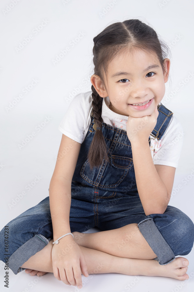 Asian cute girl in jump suit with smile face Asian cute girl in jump suit with smile face