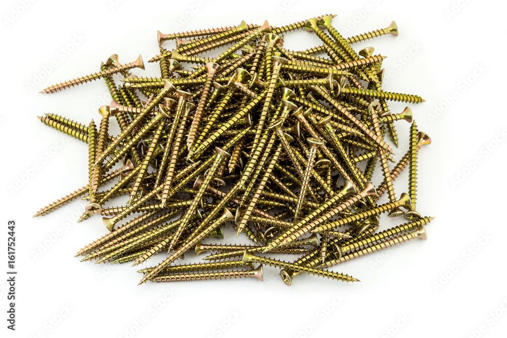 A multitude Galvanized golden screws on white background A multitude Galvanized golden screws on white background