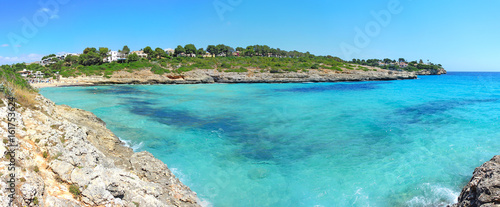 Landscape of the beautiful bay of Cala Mandia with a wonderful turquoise sea, Porto Cristo, Majorca, Spain 