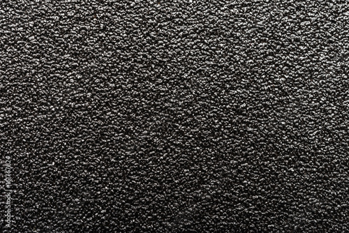 background of rough black sand paper