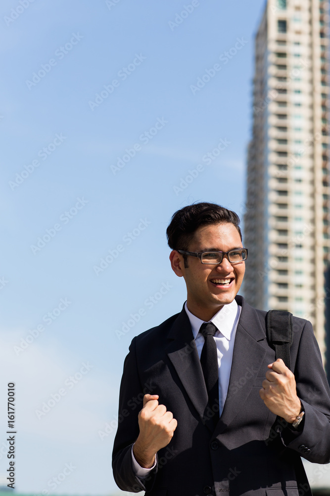 Young asian businessman outdoors Young asian businessman outdoors