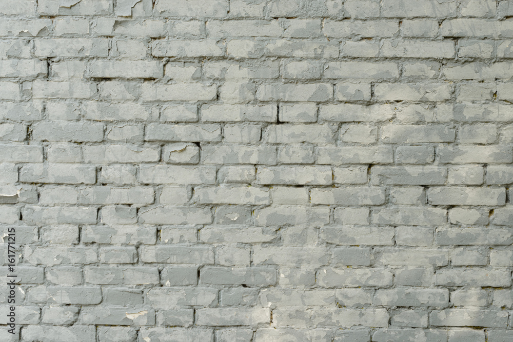 Fototapeta premium Brick texture with scratches and cracks