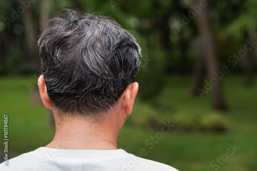 old senior or middle aged man with grey hair problem