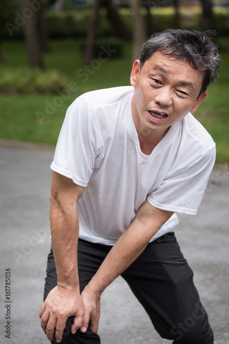 man with knee joint pain, arthritis, inflammation, asian senior or middle age