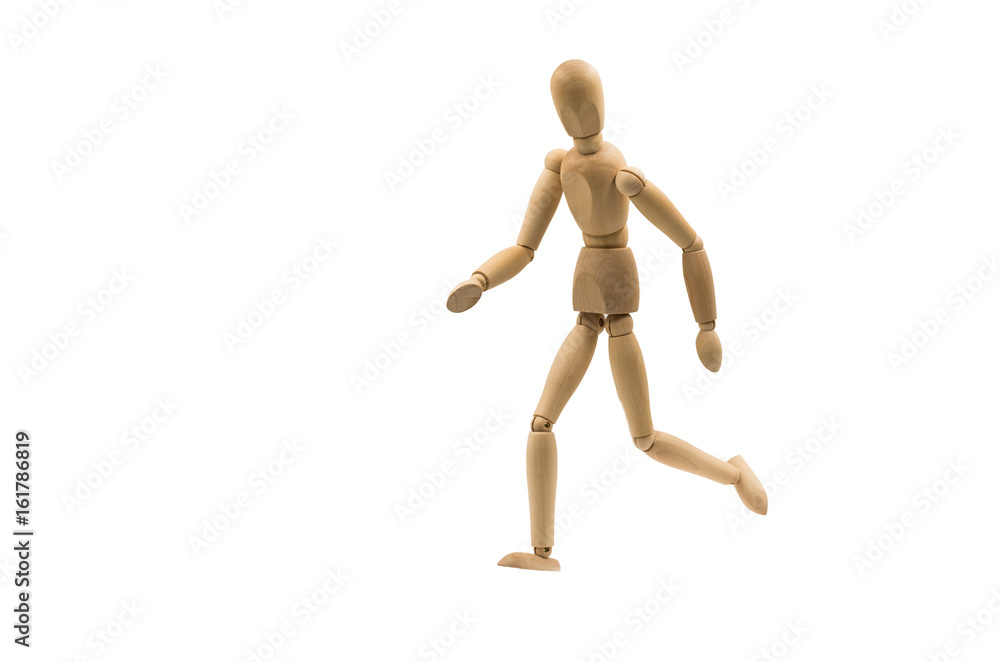 running wooden man puppet on white background running wooden man puppet on white background