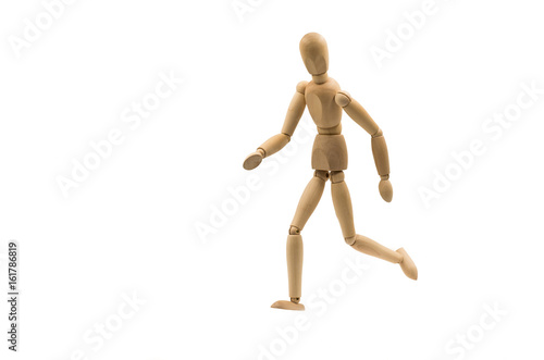 running wooden man puppet on white background