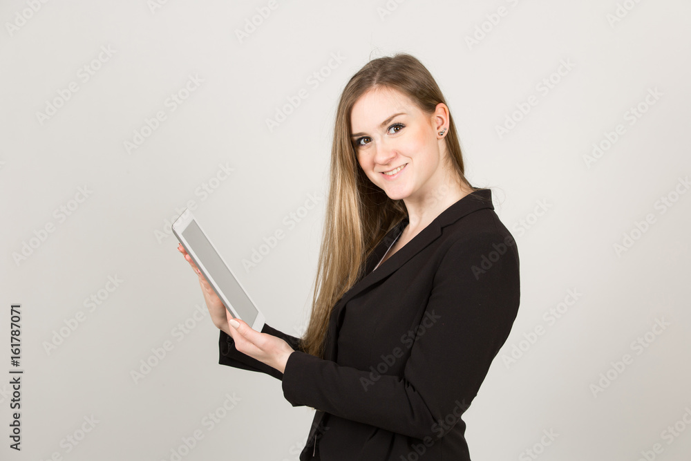 Junge Frau / Dame / Business Outfit mit Tablet / Computer / Neue Medien Junge Frau / Dame / Business Outfit mit Tablet / Computer / Neue Medien