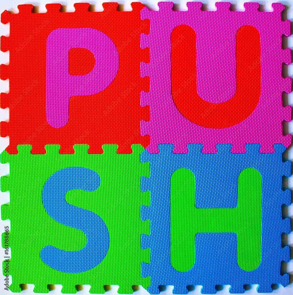 Fototapeta premium An Image of a sign - PUSH