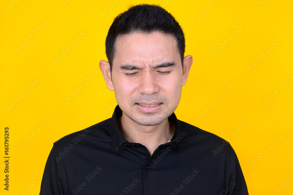 A man expressing very sad and disappointed feeling A man expressing very sad and disappointed feeling