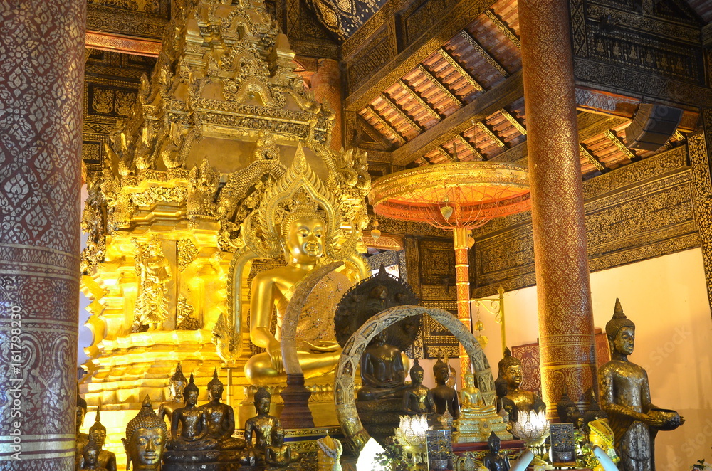 Fototapeta premium Golden Buddha statue in Thailand Buddha Temple.
