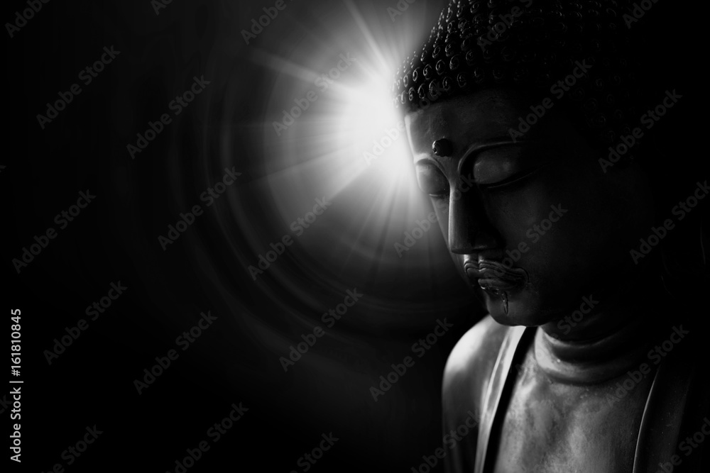 zen style buddha with light of wisdom black and white, peacful asian buddha tao religion art style statue.