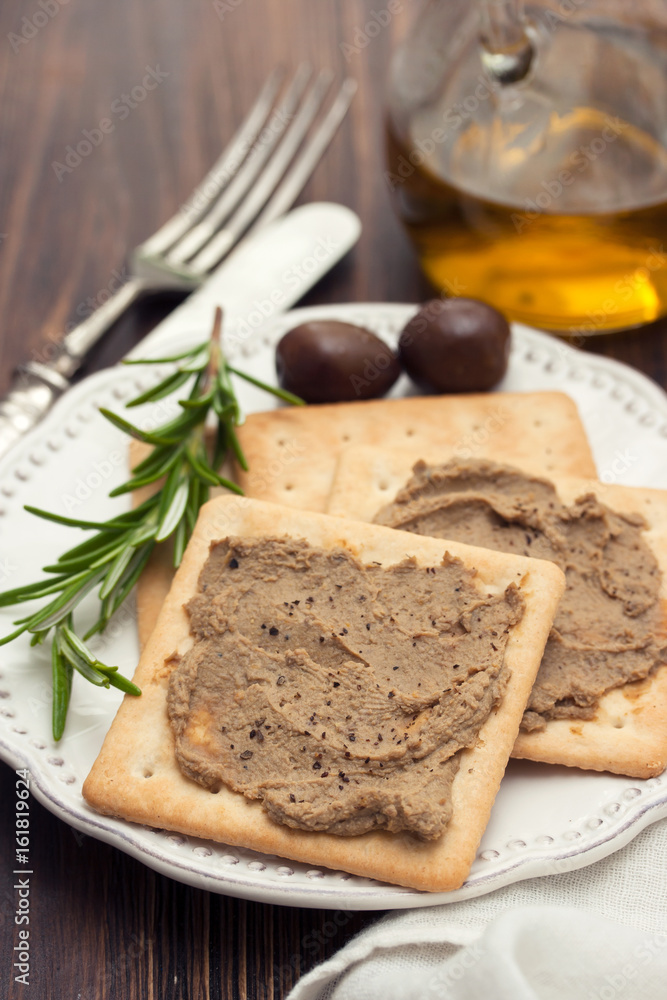 pate with toasts on white plate pate with toasts on white plate