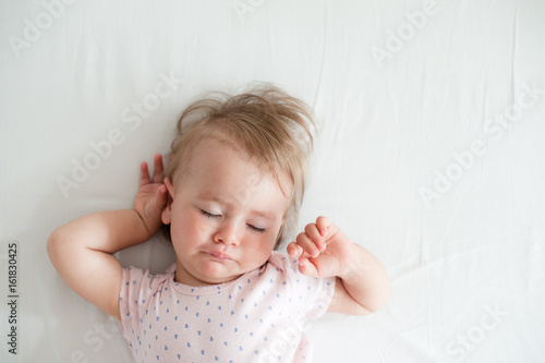 Baby waking up stretching