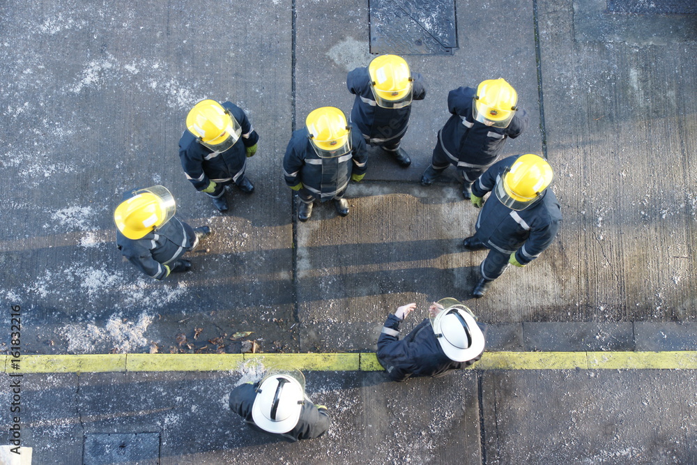 Naklejka premium fire-fighters in full fire kit, fire crew