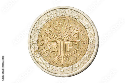 French coin of two euro closeup with tree symbol with the motto Liberte Egalite Fraternite of France. Isolated on white studio background. photo