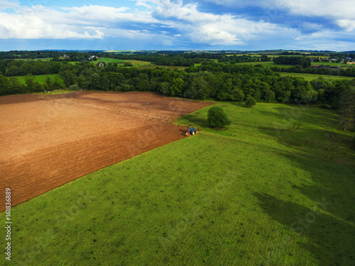 Tractor Ploughing Plowing Field - Aerial Shot
