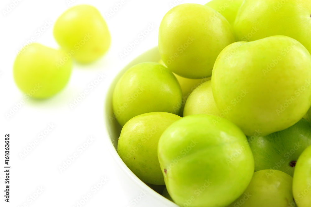 fresh turkish can erik plum fruits in a small white bowl fresh turkish can erik plum fruits in a small white bowl