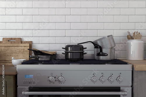 Fotografie Pots and pans stacked on a stove top