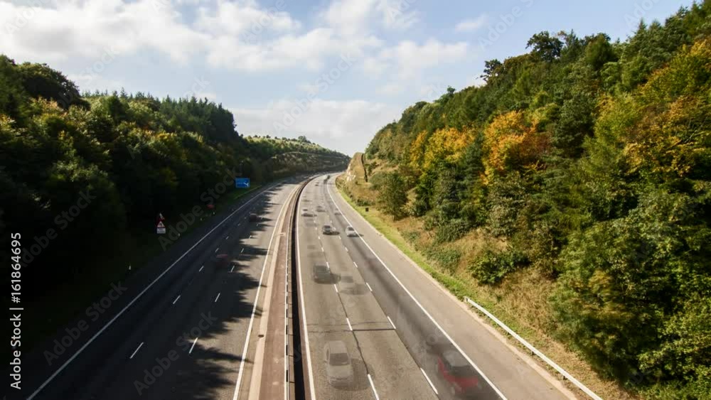 Time Lapse Sequence Showing Traffic On Busy Motorway Time Lapse Sequence Showing Traffic On Busy Motorway
