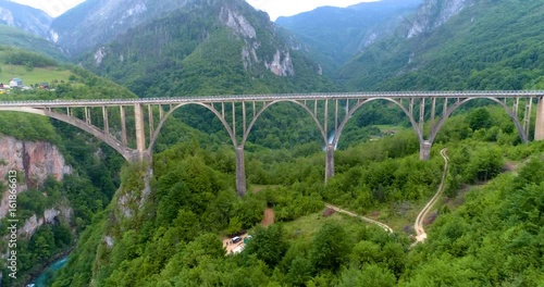 Djurdjevic Bridge is a concrete arch bridge across the Tara River.  photo