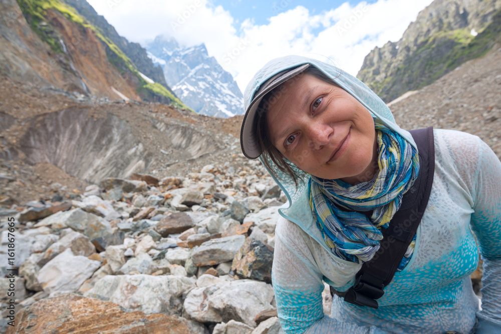 Naklejka premium Portrait of happy woman, traveler