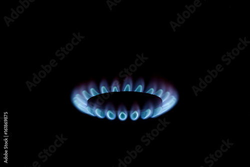 Blue gas flame on a black background