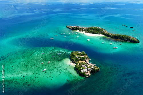 Aerial view of beautiful bay in tropical Island with white sand. Boracay Island, Philippines.