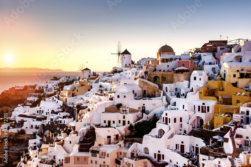  Beautiful sunset on the island of Santorini, Greece. A view of the village of Oia.