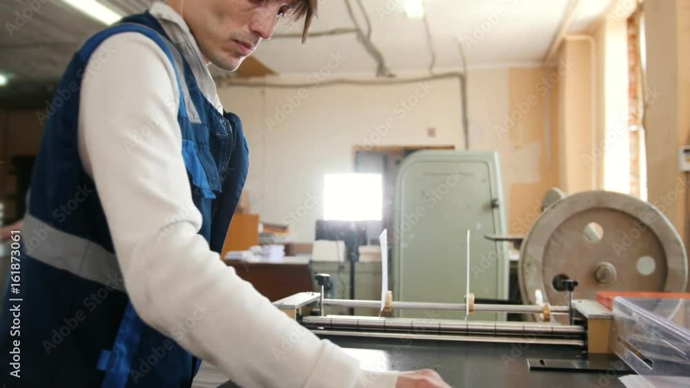 Worker man at Polygraphy printing industry Worker man at Polygraphy printing industry