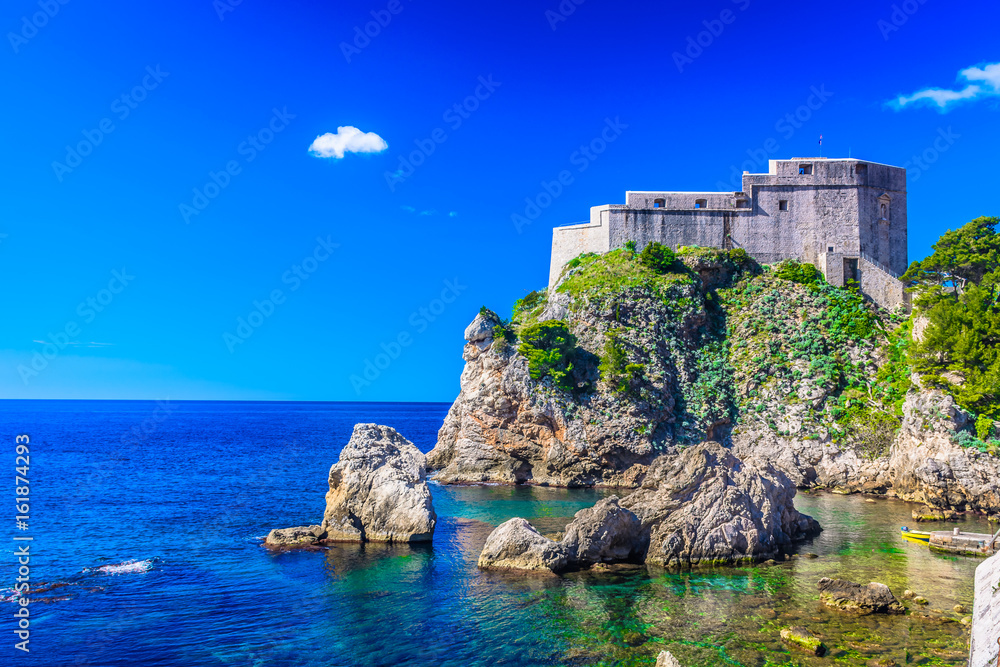 Croatia Dubrovnik seascape. / Amazing summer landscape in Dubrovnik with beach under famous historic fort, Croatia, popular european travel resort. 