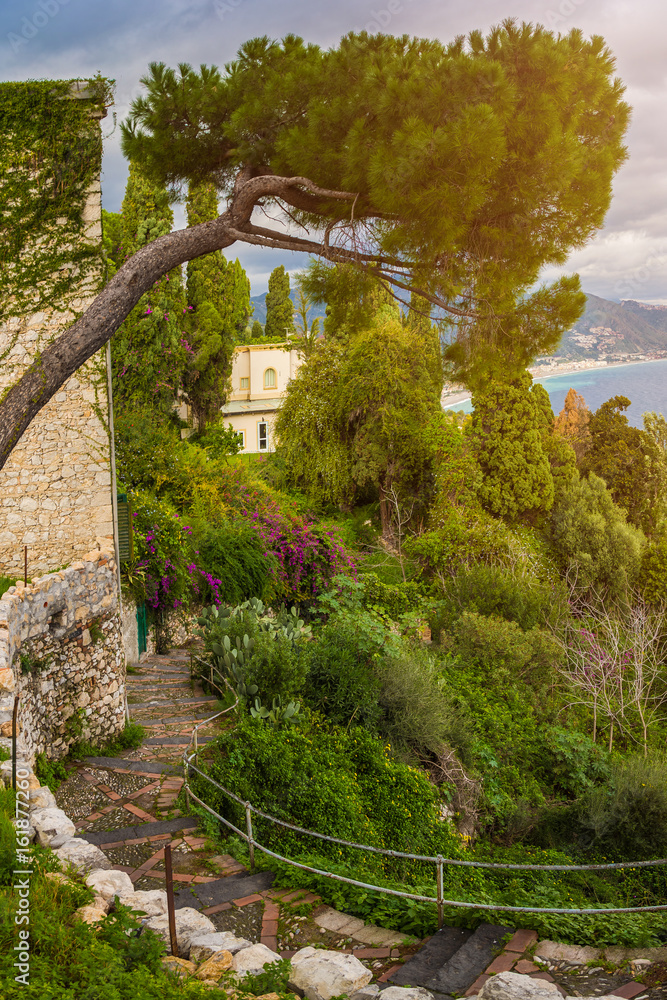 Taormina, Sicily - Panoramic view of Taormina, Mazzaro with the shores of Italy at the background