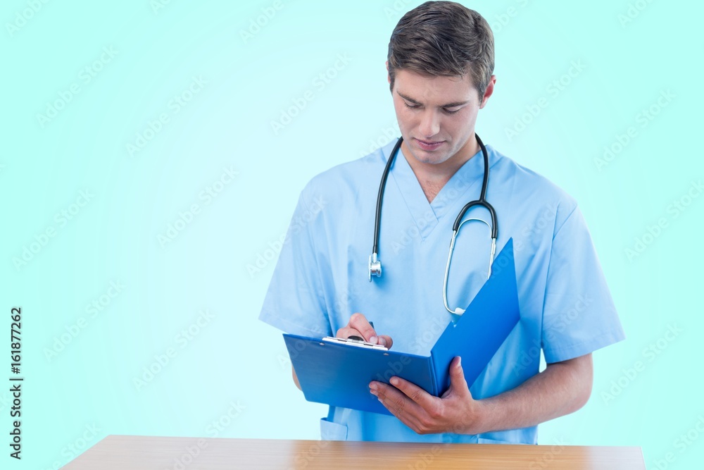 Composite 3d image of handsome surgeon writing on clipboard Composite 3d image of handsome surgeon writing on clipboard