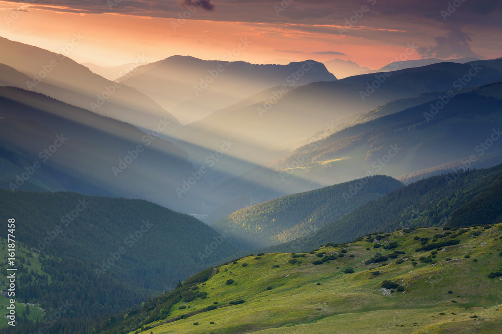 Summer sunrise landscape in the Carpathians Mountains, on Transalpina mountain road, Romania