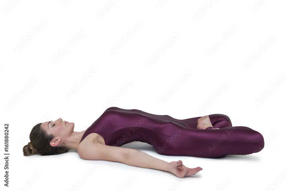 Sporty young woman doing yoga practice isolated on white background Sporty young woman doing yoga practice isolated on white background